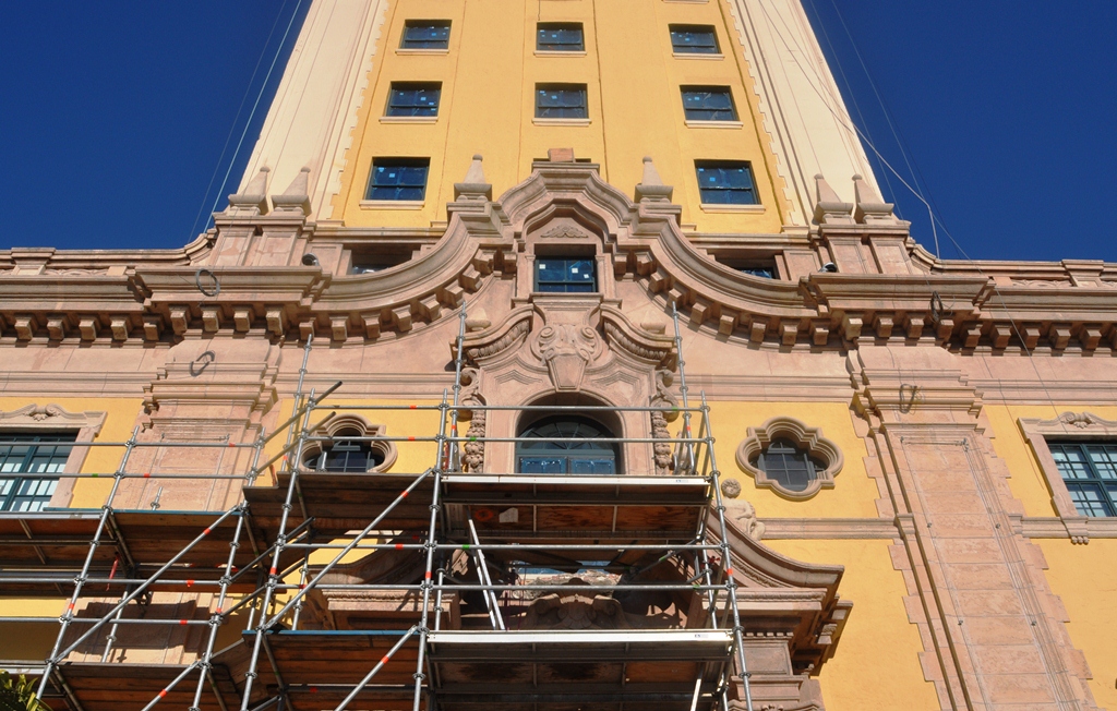 yellow building with intricately decorated trim